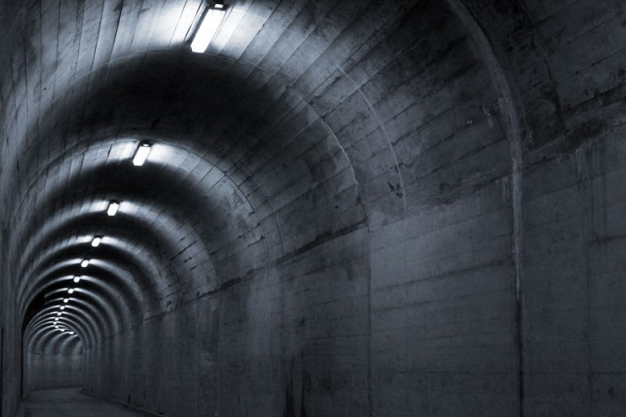 Batten lights illuminating an underground tunnel